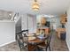Cozy dining area located near the kitchen and a staircase to the second floor at 772 Cembra Dr, Greenwood, IN 46143