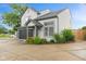 Charming home with neutral siding, a dark garage door, and lovely landscaping at 772 Cembra Dr, Greenwood, IN 46143