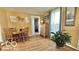 Cozy dining area featuring a wooden table set and stylish decor elements at 909 Pearl St, Columbus, IN 47201