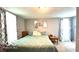 Cozy bedroom featuring ample natural light and neutral color scheme at 909 Pearl St, Columbus, IN 47201