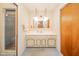 This bathroom boasts a spacious vanity and sink, plus a walk-in shower for convenience at 10104 Sycamore Ln, Indianapolis, IN 46239