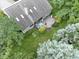 Aerial view of a backyard and deck area with outdoor seating and meticulous landscaping at 1114 Clairborne Ct, Indianapolis, IN 46280