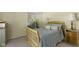 Comfortable bedroom featuring a light wood frame bed and mirrored closet at 1114 Clairborne Ct, Indianapolis, IN 46280