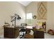 Bright home office with natural light, a large desk, and ample storage for an organized workspace at 1114 Clairborne Ct, Indianapolis, IN 46280