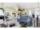 Inviting living room with vaulted ceiling and warm-toned walls, with an open floor plan at 1114 Clairborne Ct, Indianapolis, IN 46280