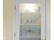 Charming pantry door features etched glass design, adding a unique touch to the kitchen space at 1114 Clairborne Ct, Indianapolis, IN 46280
