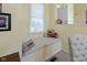 Charming window seat nook with decorative pillows, offering a cozy spot to relax at 1114 Clairborne Ct, Indianapolis, IN 46280