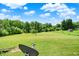 Large grassy area of backyard at 13151 W Youth Camp Rd, Columbus, IN 47201