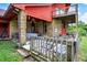 Exterior features a lower deck with furniture and an inflatable hot tub at 13151 W Youth Camp Rd, Columbus, IN 47201