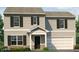 Charming two-story home featuring gray horizontal siding, a two-car garage, and a welcoming front entrance with white trim at 1334 Aster Dr, Shelbyville, IN 46176