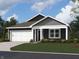 Charming single-story home featuring a two-car garage and inviting front porch at 1364 Aster Dr, Shelbyville, IN 46176