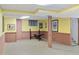 Finished basement with bright walls, tile floors and exercise equipment, offering functional and flexible space at 1420 E Loretta Dr, Indianapolis, IN 46227