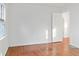Bright bedroom with hardwood floors, white walls and trim, and natural light at 1420 E Loretta Dr, Indianapolis, IN 46227