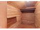 All wood closet with shelves and wooden rod at 1420 E Loretta Dr, Indianapolis, IN 46227