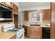 Functional kitchen with classic appliances and ample cabinet space at 1420 E Loretta Dr, Indianapolis, IN 46227