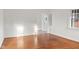 Bright living room with hardwood floors, archway entrance, and natural light at 1420 E Loretta Dr, Indianapolis, IN 46227