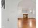 Inviting living room with hardwood floors, fireplace and archway entry at 1420 E Loretta Dr, Indianapolis, IN 46227