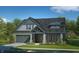 Charming home with grey shingles, stone accents, and a two-car garage at 14565 Bedford Falls Dr, Carmel, IN 46032