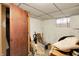 Unfinished basement with a small window and concrete walls is ready to be remodeled at 2029 N Colorado Ave, Indianapolis, IN 46218