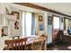 Dining area with a window and views into the kitchen and living areas at 2029 N Colorado Ave, Indianapolis, IN 46218