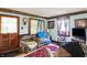 Cozy living room featuring comfortable seating and a television at 2029 N Colorado Ave, Indianapolis, IN 46218