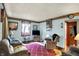 Spacious living room with carpet, comfortable seating and natural light at 2029 N Colorado Ave, Indianapolis, IN 46218