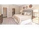 Bedroom with a large bed, en-suite bathroom, and stylish decor for a relaxing and private space at 2057 Abbey Ln, Columbus, IN 47201