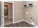 Laundry room featuring tile floor and wire shelves at 2057 Abbey Ln, Columbus, IN 47201