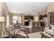 Open floor plan features a modern kitchen, a cozy dining area, and a bright living space at 2057 Abbey Ln, Columbus, IN 47201