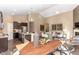 Open-concept living area featuring a modern kitchen, dining space, and comfortable seating at 2057 Abbey Ln, Columbus, IN 47201
