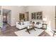 Bright living room features modern decor, high ceilings, and stylish furnishings at 2057 Abbey Ln, Columbus, IN 47201