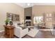 Spacious living room with a fireplace, tall ceilings, and lots of natural light at 2057 Abbey Ln, Columbus, IN 47201