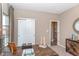 Office features wooden desk and view into another room at 2057 Abbey Ln, Columbus, IN 47201