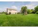 Large, well-maintained backyard with a playset, perfect for Gathering activities and outdoor fun at 20846 Winding Lake E Dr, Noblesville, IN 46062