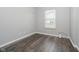 Cozy bedroom with hardwood flooring, neutral walls, and natural light at 20846 Winding Lake E Dr, Noblesville, IN 46062