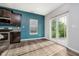 Bright dining space features a sliding glass door to the backyard and views of the outdoor greenery at 20846 Winding Lake E Dr, Noblesville, IN 46062