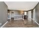 Open living space with modern gray walls, a wooden floor, and white trim for a bright, airy feel at 20846 Winding Lake E Dr, Noblesville, IN 46062