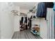 Organized walk-in closet with shelving, clothes racks, and a well-lit area for maximum efficiency at 20846 Winding Lake E Dr, Noblesville, IN 46062