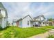 Cozy single-Gathering home with a quaint covered porch perfect for enjoying the outdoors and grassy front lawn at 2111 Central Ave, Anderson, IN 46016