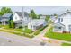 View of a charming single-story house with a front porch, showcasing its inviting facade and well-kept surroundings at 2111 Central Ave, Anderson, IN 46016