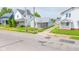 Charming single-story home featuring a welcoming front porch and well-maintained surroundings at 2111 Central Ave, Anderson, IN 46016