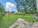 Exterior of the property featuring a yard, house, storage and fencing at 2426 Lasalle St, Indianapolis, IN 46218