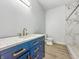 Bathroom showcasing vanity with marble countertop and modern shower at 2426 Lasalle St, Indianapolis, IN 46218
