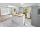 Updated kitchen featuring an island with sink, butcher block countertops, and stainless steel appliances at 2426 Lasalle St, Indianapolis, IN 46218