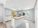 Updated kitchen featuring an island with sink, butcher block countertops, and stainless steel refrigerator at 2426 Lasalle St, Indianapolis, IN 46218