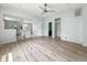Open-concept living area with wood flooring and kitchen at 2426 Lasalle St, Indianapolis, IN 46218