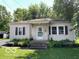 Charming single-story home with a well-maintained lawn and tidy landscaping at 249 Ohio St, Franklin, IN 46131