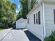 View of the detached garage and a side view of the house at 249 Ohio St, Franklin, IN 46131
