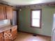 Traditional kitchen features wood cabinets, and a window for natural light at 249 Ohio St, Franklin, IN 46131