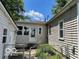 Back of home showing garage, sunroom and access to the backyard at 249 Ohio St, Franklin, IN 46131